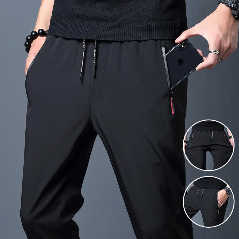 
                  
                    2024 New Men'S Korean Fashion Casual Summer Thin Quick Drying Ice Silk Straight Pants Loose Sports 9-Point Trousers Boy
                  
                