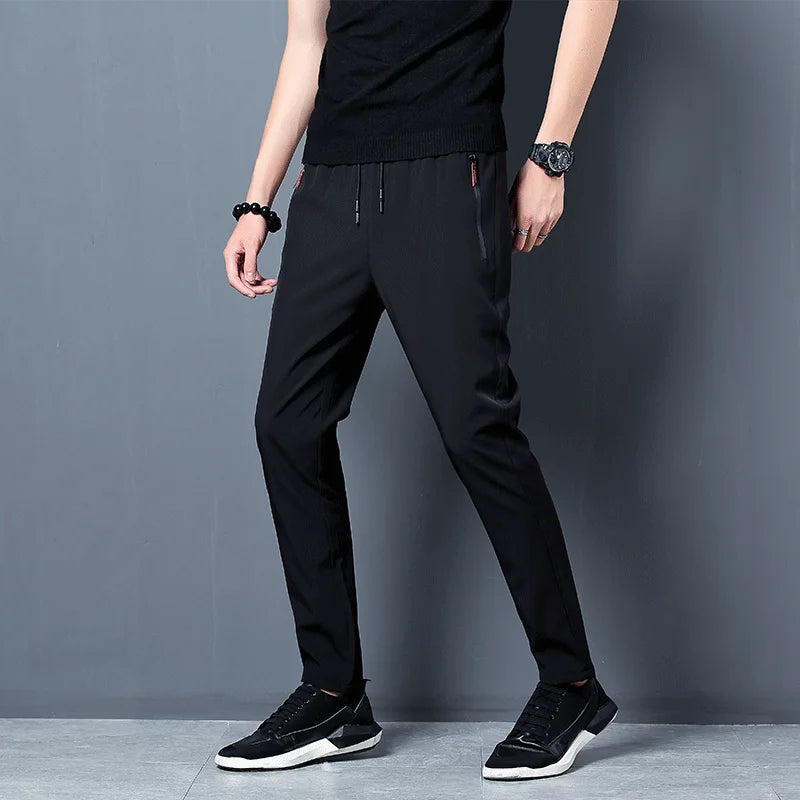 2024 New Men'S Korean Fashion Casual Summer Thin Quick Drying Ice Silk Straight Pants Loose Sports 9-Point Trousers Boy