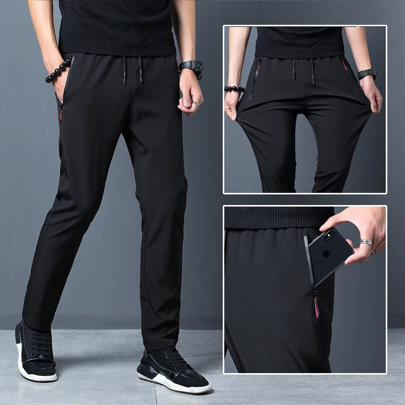 
                  
                    2024 New Men'S Korean Fashion Casual Summer Thin Quick Drying Ice Silk Straight Pants Loose Sports 9-Point Trousers Boy
                  
                