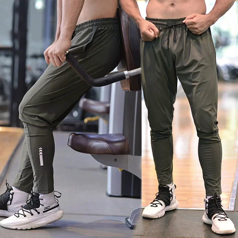 
                  
                    Men Sport Pant Training Bodybuilding Trousers Youngster Fitness Running Sweatpant Thin Elastic Dry Fit Zipper Pockets Long Pants
                  
                