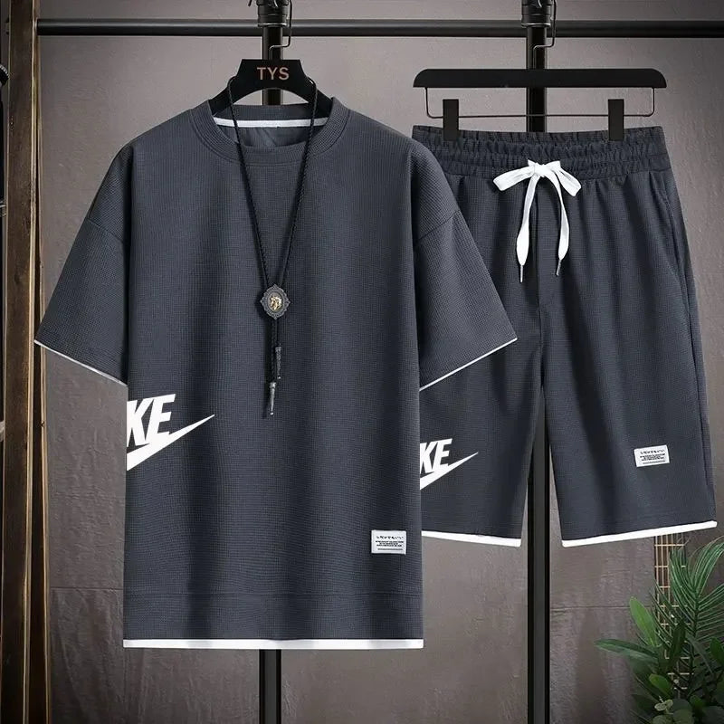 
                  
                    Summer Men's Waffle Sets Casual T-Shirt And Shorts Set Male Sports Suit Solid Color Tracksuit Loose Suits Size 3XL
                  
                