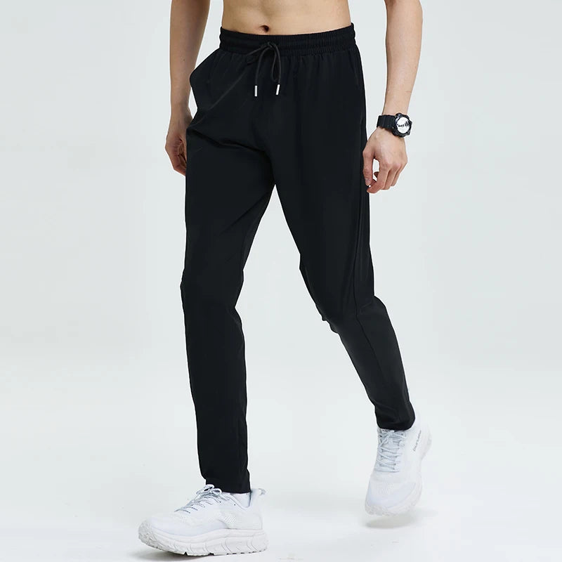 
                  
                    Gym Fitness Trousers Men's Pencil Pants Tight Jogging Running Breathable Quick-Drying Ice Silk Sports Wind Casual Fashion Pants
                  
                