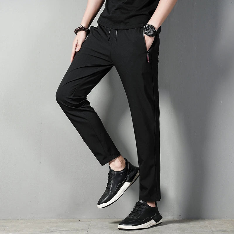 
                  
                    MOUNT Summer men's casual pants slim fit thin Korean version ice silk pants Jinlun sports pants straight tube quick drying pants
                  
                