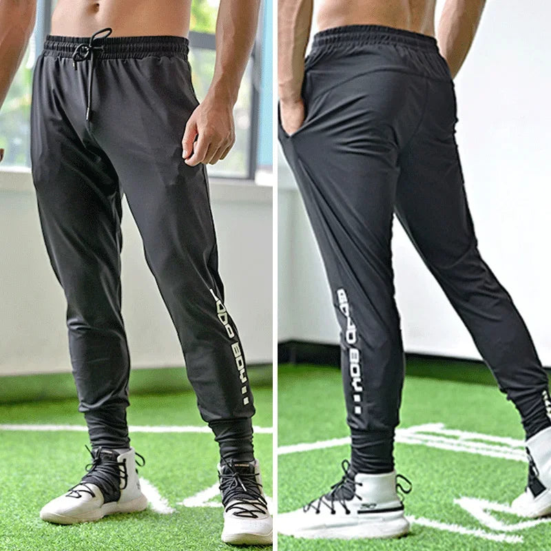 
                  
                    Men Sport Pant Training Bodybuilding Trousers Youngster Fitness Running Sweatpant Thin Elastic Dry Fit Zipper Pockets Long Pants
                  
                