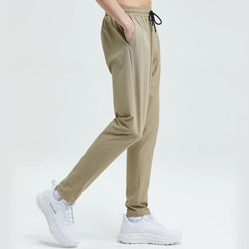 
                  
                    Gym Fitness Trousers Men's Pencil Pants Tight Jogging Running Breathable Quick-Drying Ice Silk Sports Wind Casual Fashion Pants
                  
                