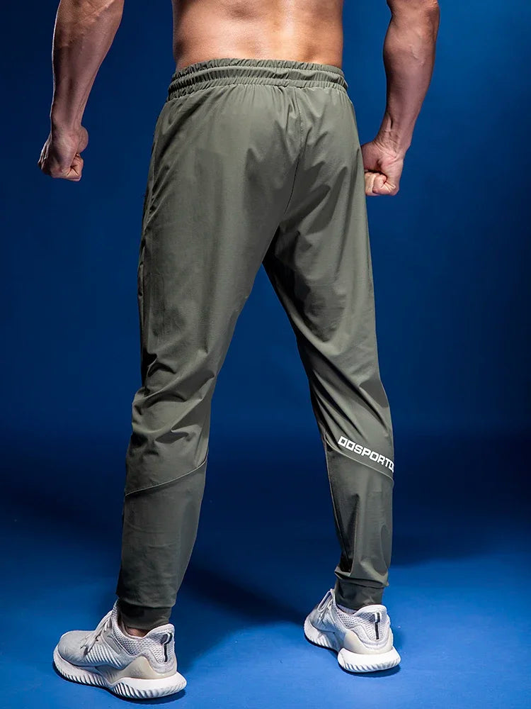 
                  
                    Men Sport Pant Training Bodybuilding Trousers Youngster Fitness Running Sweatpant Thin Elastic Dry Fit Zipper Pockets Long Pants
                  
                