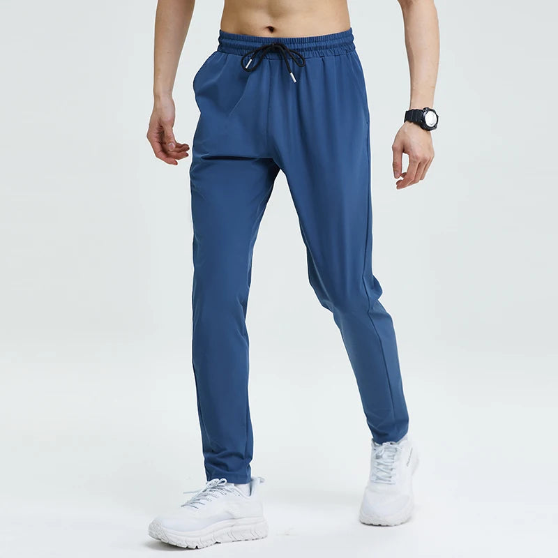 
                  
                    Gym Fitness Trousers Men's Pencil Pants Tight Jogging Running Breathable Quick-Drying Ice Silk Sports Wind Casual Fashion Pants
                  
                