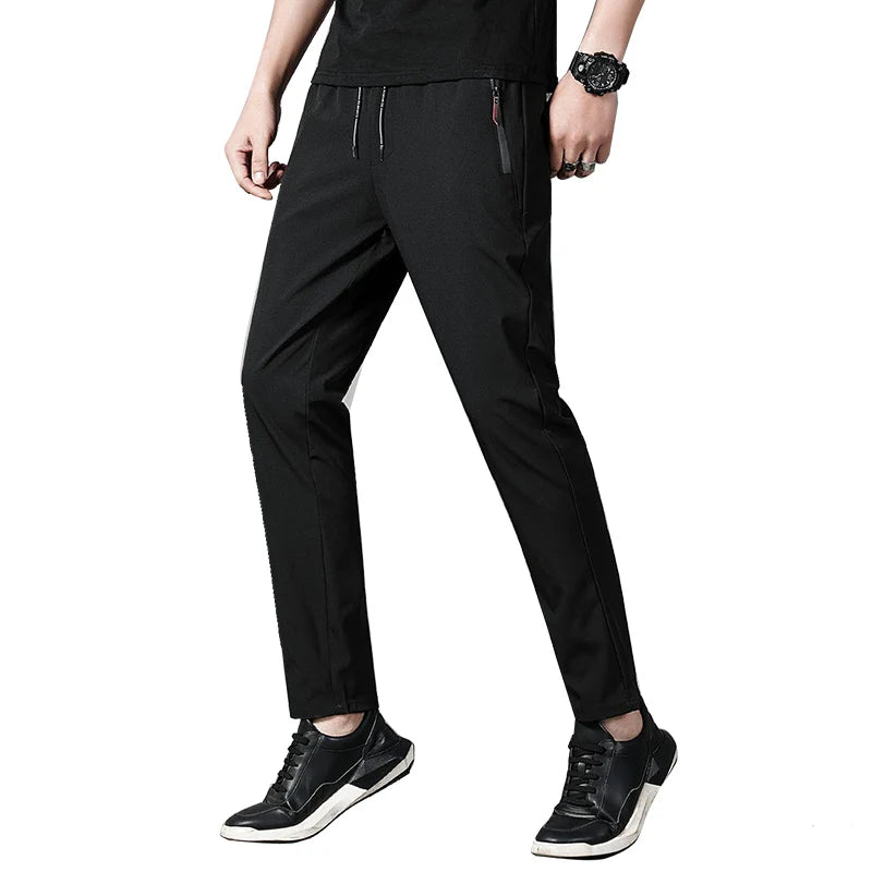 
                  
                    MOUNT Summer men's casual pants slim fit thin Korean version ice silk pants Jinlun sports pants straight tube quick drying pants
                  
                