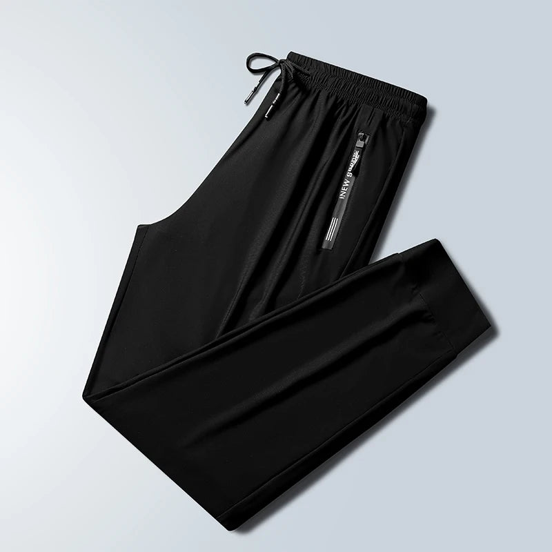 
                  
                    2024 New Ice Silk Pants for Men's Summer Thin Casual Pants for Men's Breathable Tight Feet Loose, High Elastic, Quick Drying Air
                  
                