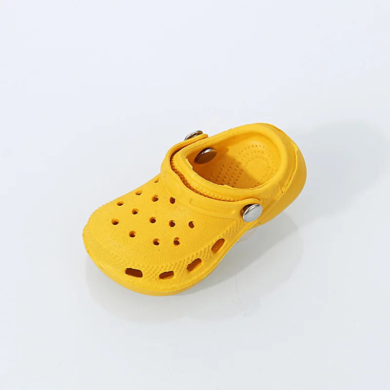 
                  
                    3D New Mini Shoes Shape PVC Shoe Charms for Crocs Accessories Women Beach Bag Sandals Buckle Kids Shoe Pins DIY Shoe Decorations
                  
                