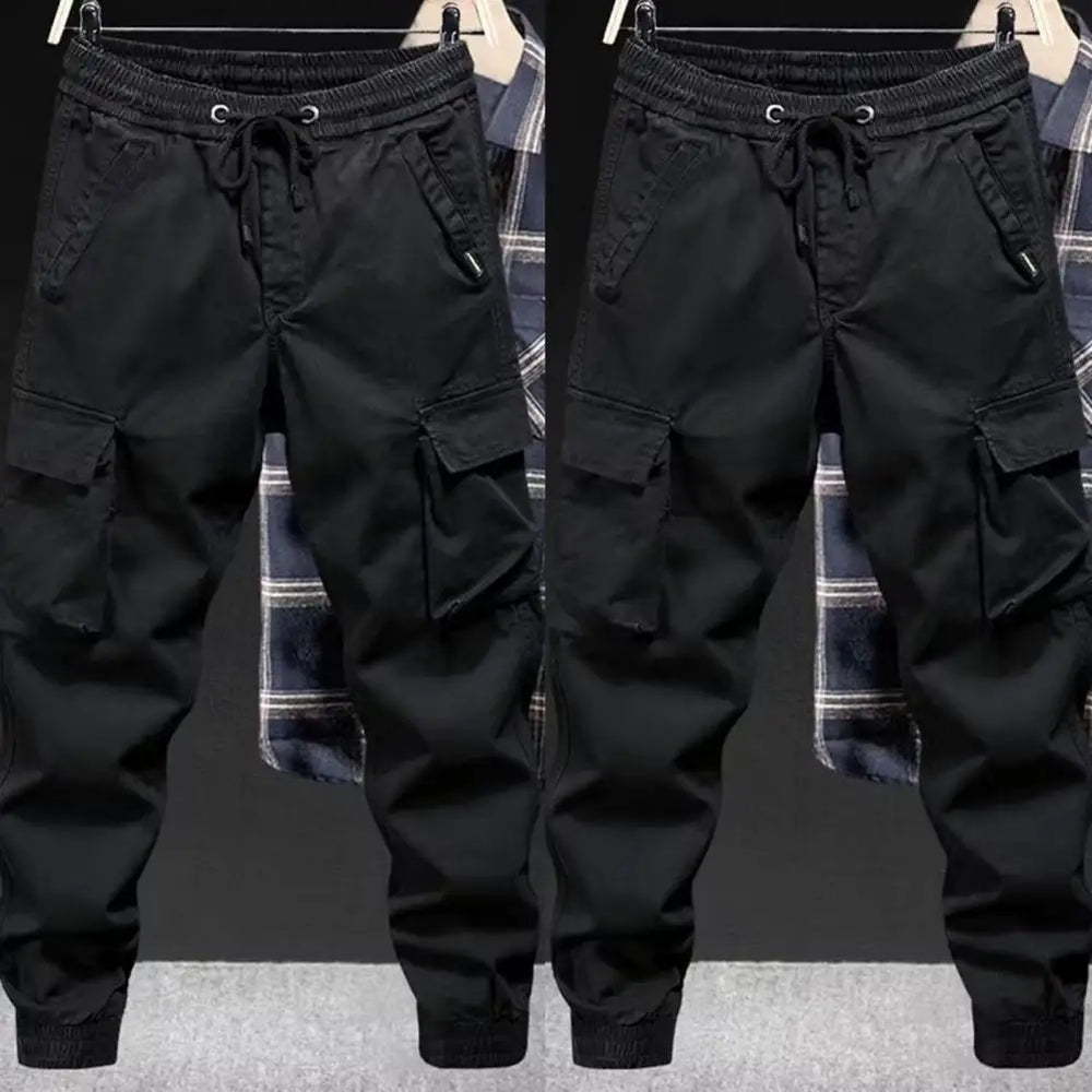 
                  
                    Men Cargo Pants Solid Color Drawstring Elastic Waist Long Trousers Loose Multi Pockets Ankle-banded Hip Hop Trousers
                  
                