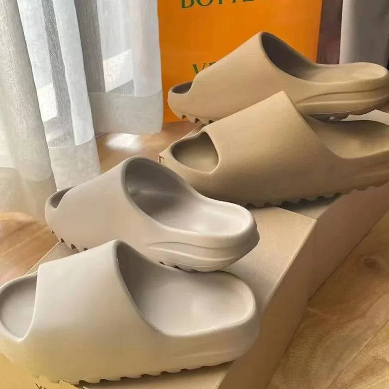 
                  
                    Yezzy EVASlippers Clouds Women's Sandals Men's Slippers Soft Thick Bottom Inner and Outdoor Height Increasing Shoes Couple 36-45
                  
                