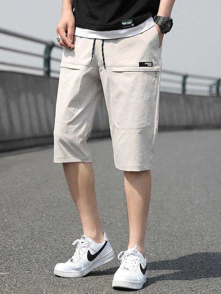 
                  
                    Plus Size Summer Capris Pants Men Breathable Light Cool Calf-Length Short Sweatpants 3/4 Straight Loose Casual Cropped Trousers
                  
                