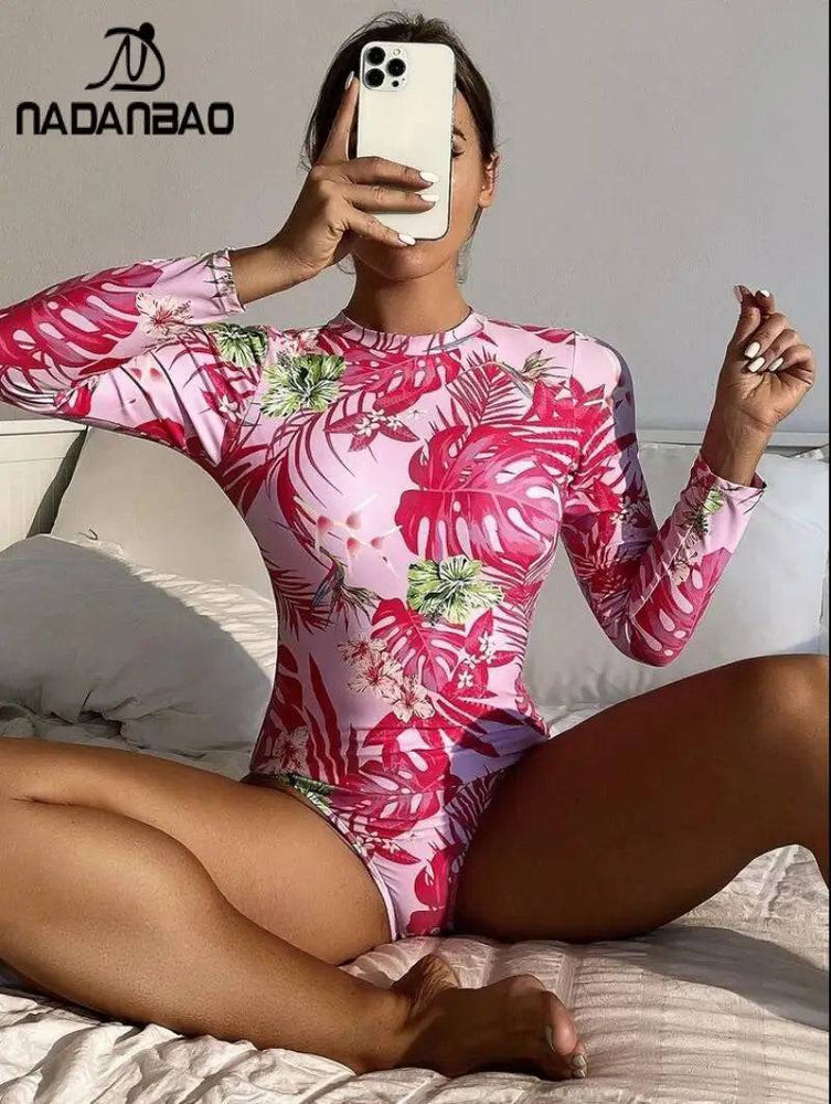 
                  
                    NADANBAO Women Long Sleeves One Piece Swimsuits Sexy Backless Swimwear Printing Body Suits Bathing Suit Summer Beach Wear
                  
                