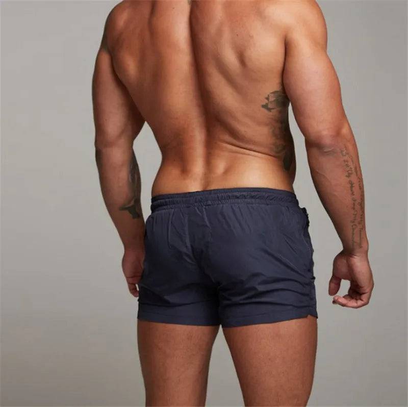 
                  
                    2024 New Mens Sexy Swimsuit Swimming Man Swimwear Men Briefs Beach Shorts Swim Trunks Sports Suits Surf Board Shorts erkek mayo
                  
                