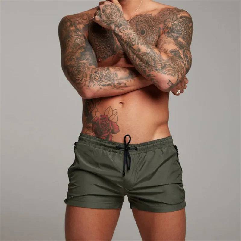 
                  
                    2024 New Mens Sexy Swimsuit Swimming Man Swimwear Men Briefs Beach Shorts Swim Trunks Sports Suits Surf Board Shorts erkek mayo
                  
                