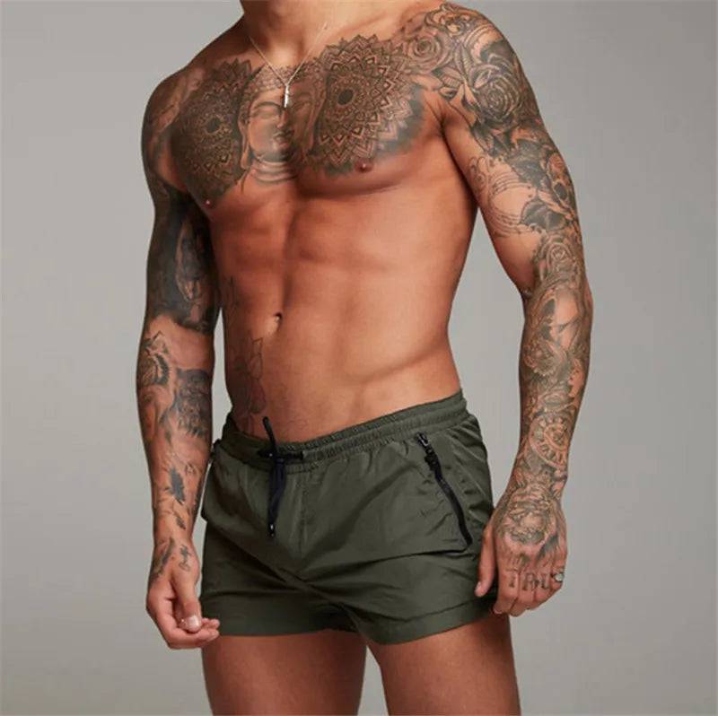 
                  
                    2024 New Mens Sexy Swimsuit Swimming Man Swimwear Men Briefs Beach Shorts Swim Trunks Sports Suits Surf Board Shorts erkek mayo
                  
                