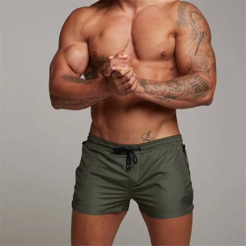 
                  
                    2024 New Mens Sexy Swimsuit Swimming Man Swimwear Men Briefs Beach Shorts Swim Trunks Sports Suits Surf Board Shorts erkek mayo
                  
                