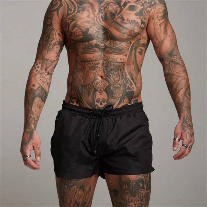 
                  
                    2024 New Mens Sexy Swimsuit Swimming Man Swimwear Men Briefs Beach Shorts Swim Trunks Sports Suits Surf Board Shorts erkek mayo
                  
                