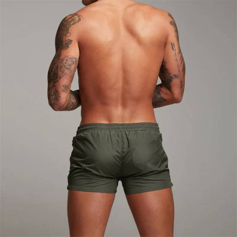 
                  
                    2024 New Mens Sexy Swimsuit Swimming Man Swimwear Men Briefs Beach Shorts Swim Trunks Sports Suits Surf Board Shorts erkek mayo
                  
                