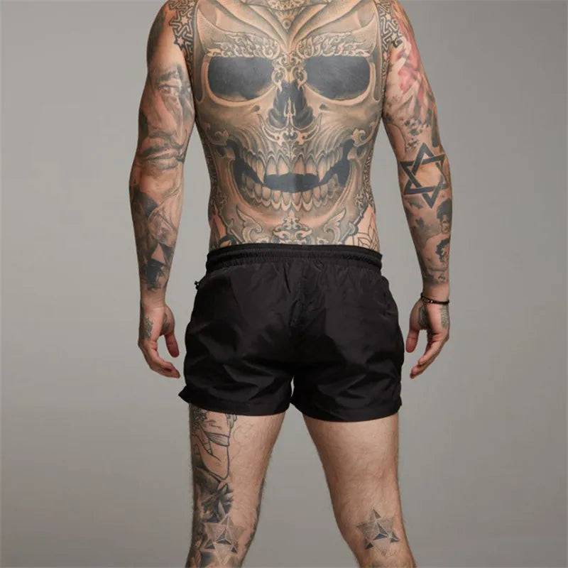 
                  
                    2024 New Mens Sexy Swimsuit Swimming Man Swimwear Men Briefs Beach Shorts Swim Trunks Sports Suits Surf Board Shorts erkek mayo
                  
                