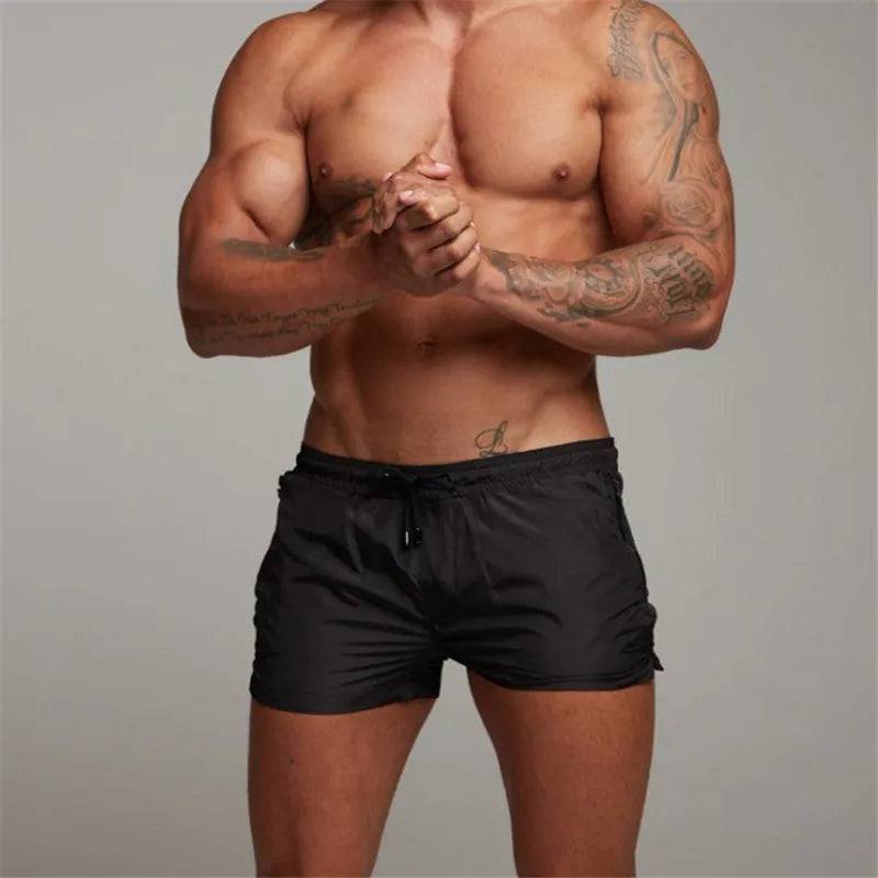 
                  
                    2024 New Mens Sexy Swimsuit Swimming Man Swimwear Men Briefs Beach Shorts Swim Trunks Sports Suits Surf Board Shorts erkek mayo
                  
                