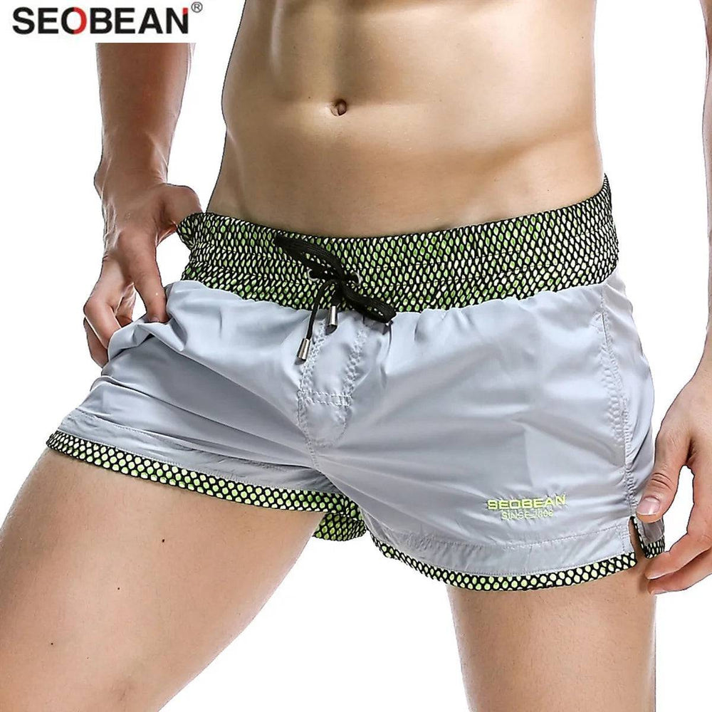 
                  
                    SEOBEAN Brand Mens Beach Shorts Breathable Quick Dry Nylon Fabric Board Shorts Men Swim Trunks Shorts
                  
                