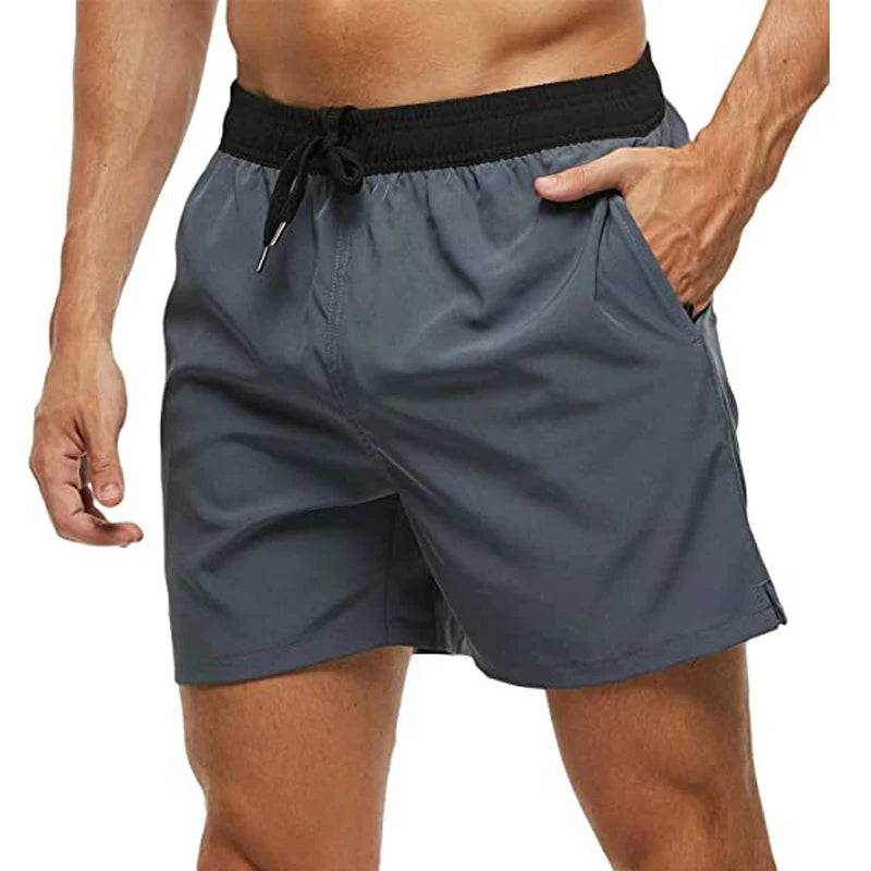 
                  
                    Elastic Closure Men's Swim Trunks Quick Dry Beach Shorts with Zipper Pockets and Mesh Lining
                  
                