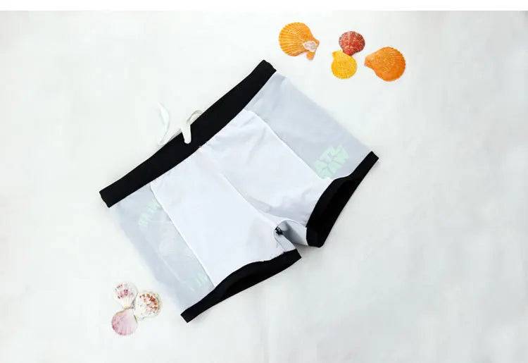 
                  
                    New Child New  Summer Swim Trunks Boys Swimwear Kids Letter Bathing Suits Children Swimming Shorts Boys Beach Swimwears Boy
                  
                