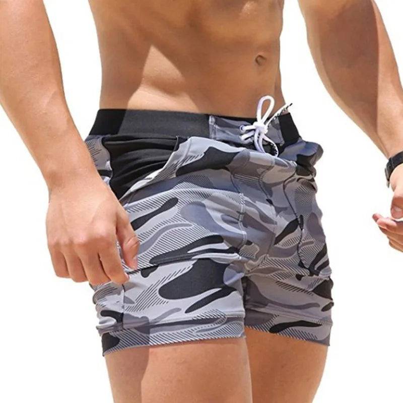 
                  
                    Men's Swimming Trunks Summer Swimming Fitness Shorts Men's Fashion Sports Beachwear Quick-Drying Stretch Beach Pants
                  
                