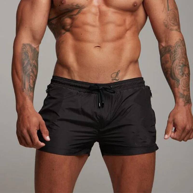 
                  
                    2024 New Mens Swimsuit Sexy Swimwear Men Swimming Shorts Men Briefs Beach Shorts Sports Suits Surf Board Shorts Men Swim Trunks
                  
                