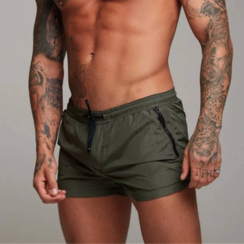 
                  
                    2024 New Mens Swimsuit Sexy Swimwear Men Swimming Shorts Men Briefs Beach Shorts Sports Suits Surf Board Shorts Men Swim Trunks
                  
                