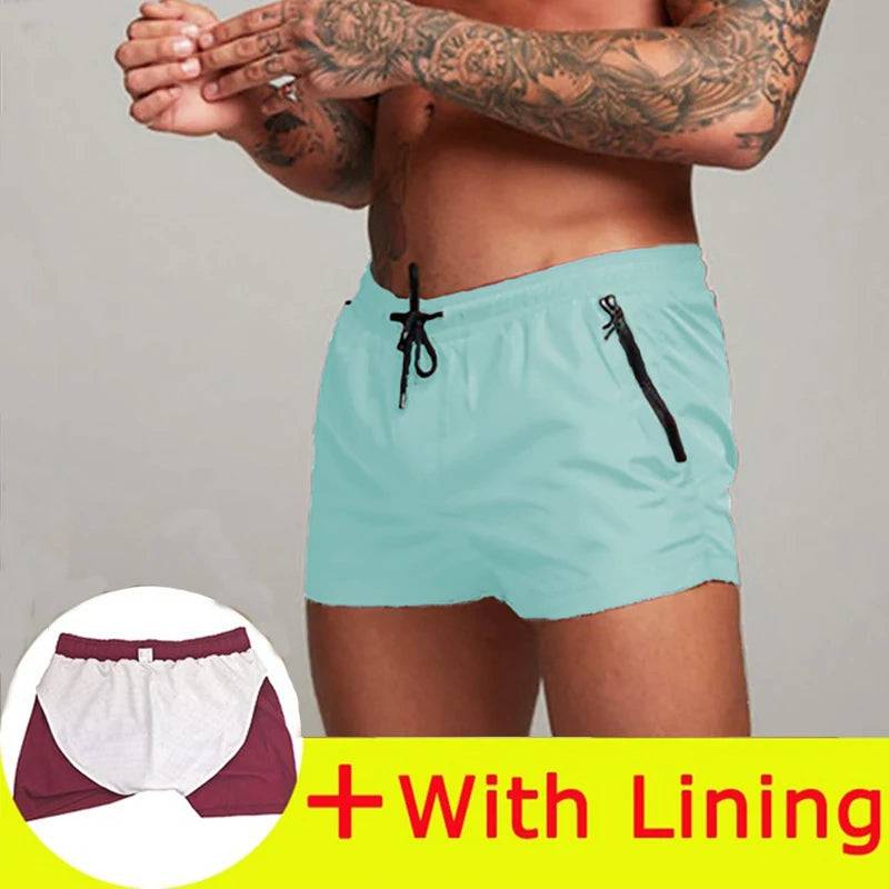 
                  
                    2024 New Mens Swimsuit Sexy Swimwear Men Swimming Shorts Men Briefs Beach Shorts Sports Suits Surf Board Shorts Men Swim Trunks
                  
                