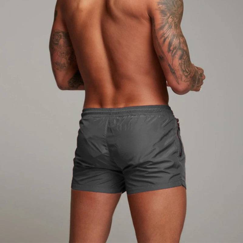 
                  
                    2024 New Mens Swimsuit Sexy Swimwear Men Swimming Shorts Men Briefs Beach Shorts Sports Suits Surf Board Shorts Men Swim Trunks
                  
                