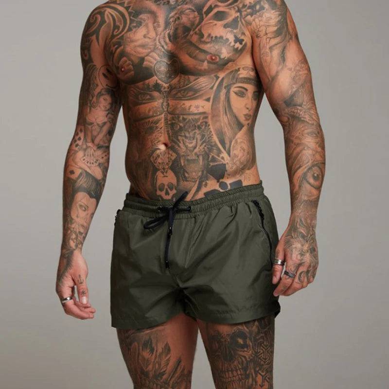 
                  
                    2024 New Mens Swimsuit Sexy Swimwear Men Swimming Shorts Men Briefs Beach Shorts Sports Suits Surf Board Shorts Men Swim Trunks
                  
                