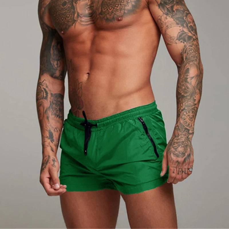 
                  
                    2024 New Mens Swimsuit Sexy Swimwear Men Swimming Shorts Men Briefs Beach Shorts Sports Suits Surf Board Shorts Men Swim Trunks
                  
                