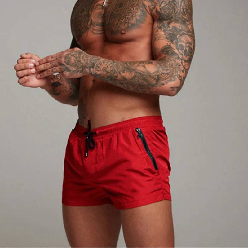 
                  
                    2024 New Mens Swimsuit Sexy Swimwear Men Swimming Shorts Men Briefs Beach Shorts Sports Suits Surf Board Shorts Men Swim Trunks
                  
                