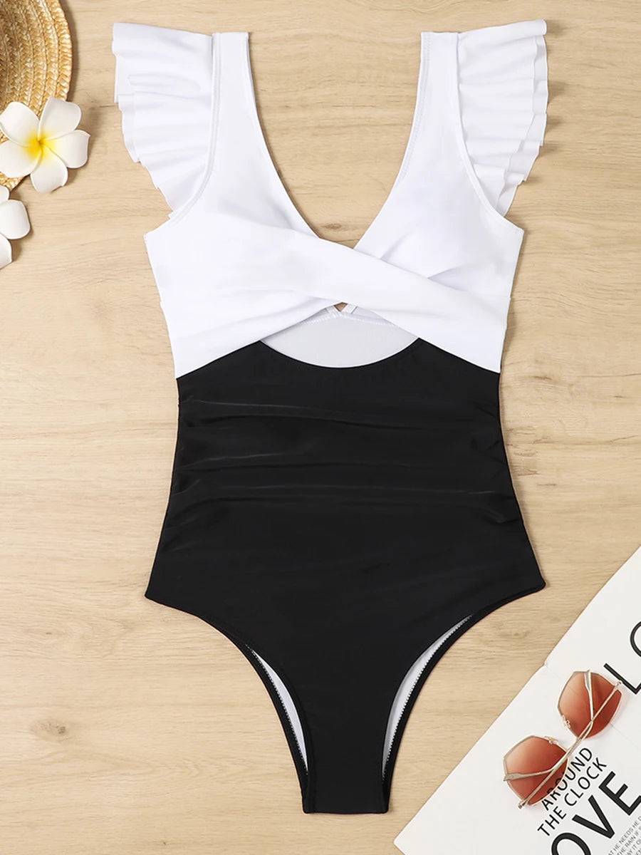 
                  
                    2024 Hollow Out Cross Ztvitality Swimsuit One Piece Solid Ruffle Swimwear Women Bathing Swimming Swim Suit Female Beach Wear
                  
                