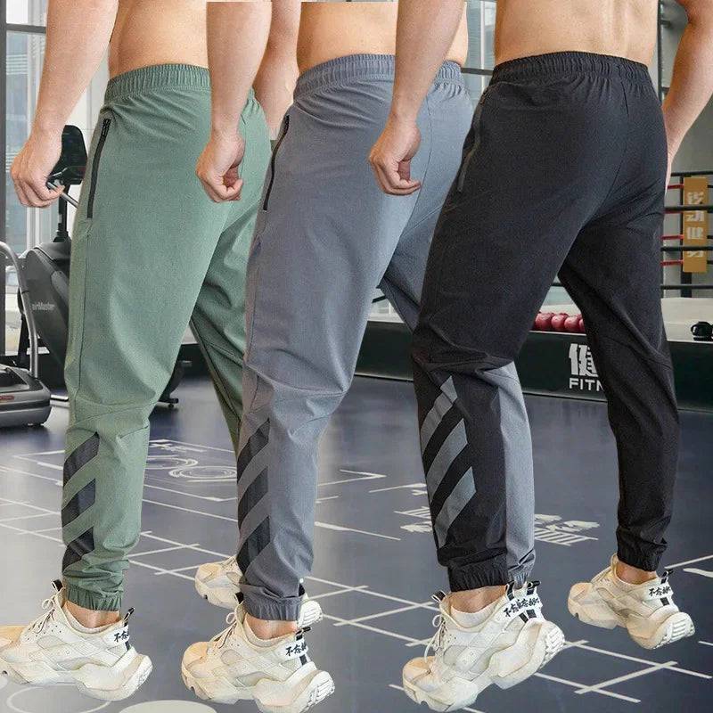 
                  
                    Mens Gym Fitness Running Sweatpants Workout Athletic Long Pants Outdoor Training Sports Trousers Elastic Waist Zipper Pockets
                  
                