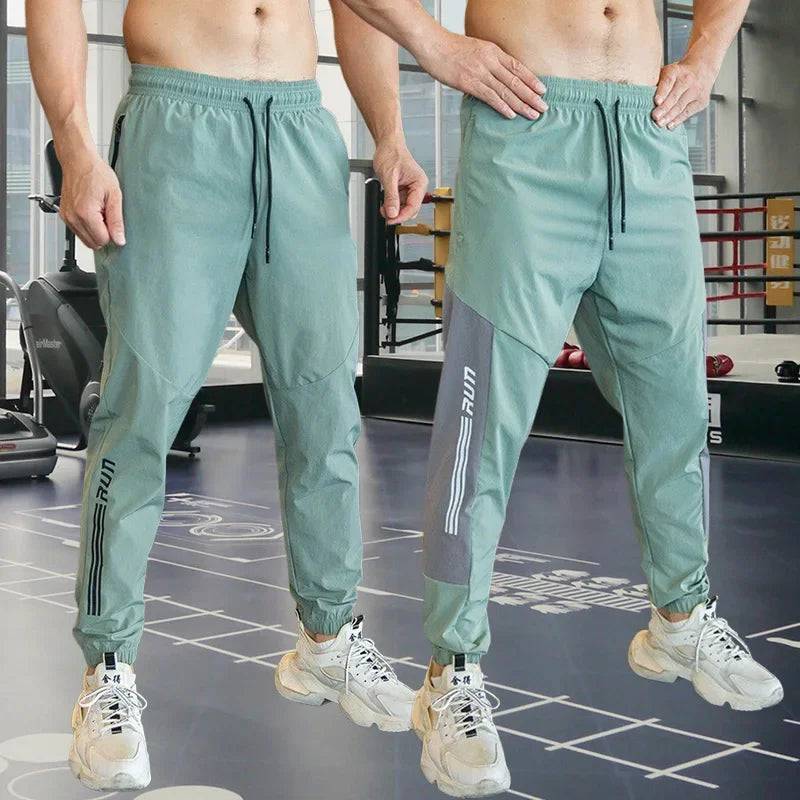 
                  
                    Mens Gym Fitness Running Sweatpants Workout Athletic Long Pants Outdoor Training Sports Trousers Elastic Waist Zipper Pockets
                  
                