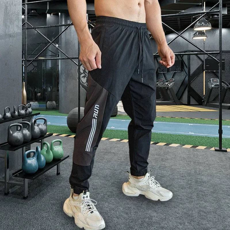 
                  
                    Mens Gym Fitness Running Sweatpants Workout Athletic Long Pants Outdoor Training Sports Trousers Elastic Waist Zipper Pockets
                  
                