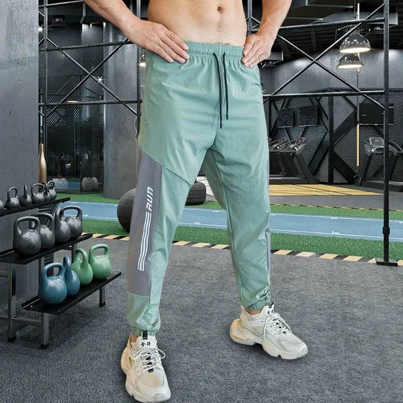 
                  
                    Mens Gym Fitness Running Sweatpants Workout Athletic Long Pants Outdoor Training Sports Trousers Elastic Waist Zipper Pockets
                  
                