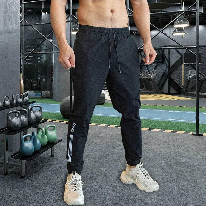 
                  
                    Mens Gym Fitness Running Sweatpants Workout Athletic Long Pants Outdoor Training Sports Trousers Elastic Waist Zipper Pockets
                  
                