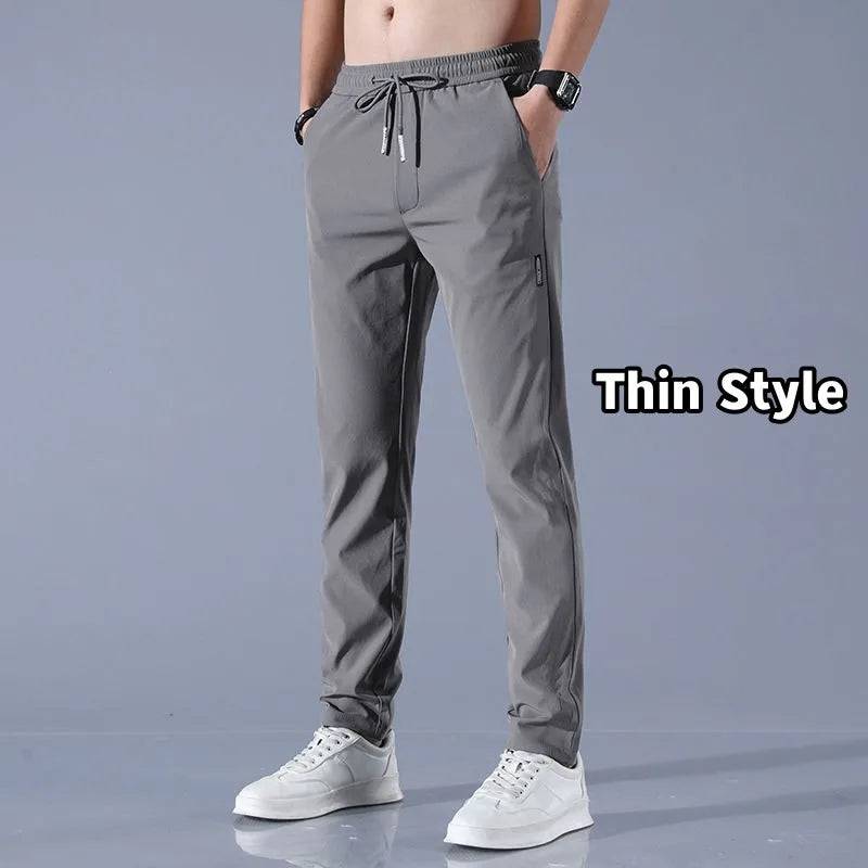 
                  
                    Autumn Pants Men Fitness Sportswear Tracksuit Elastic Waist Sweatpants Cotton Trousers Loose Gyms Jogger Track Pants Mens M- 5XL
                  
                