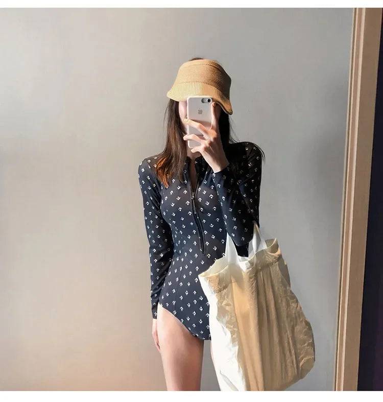 
                  
                    2024 Sexy Swimsuit Long Sleeve Sunscreen Diving Suit Slim Belly Covering One-Piece Swimming Suit
                  
                